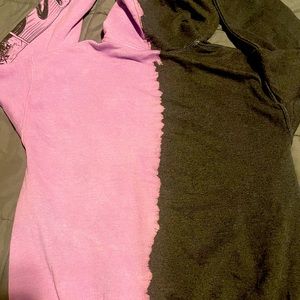 Gently used purple and black “Broken Promises “ sweater in size Medium.